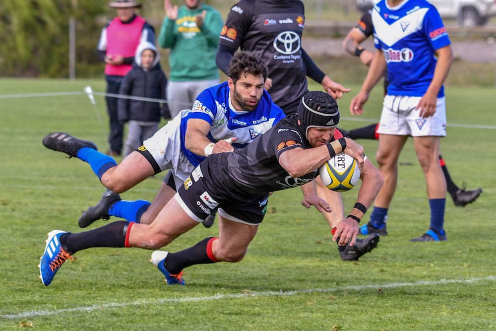 Brumbies legend Matt Giteau crossing for Gungahlin. Photo: Jayziephotography